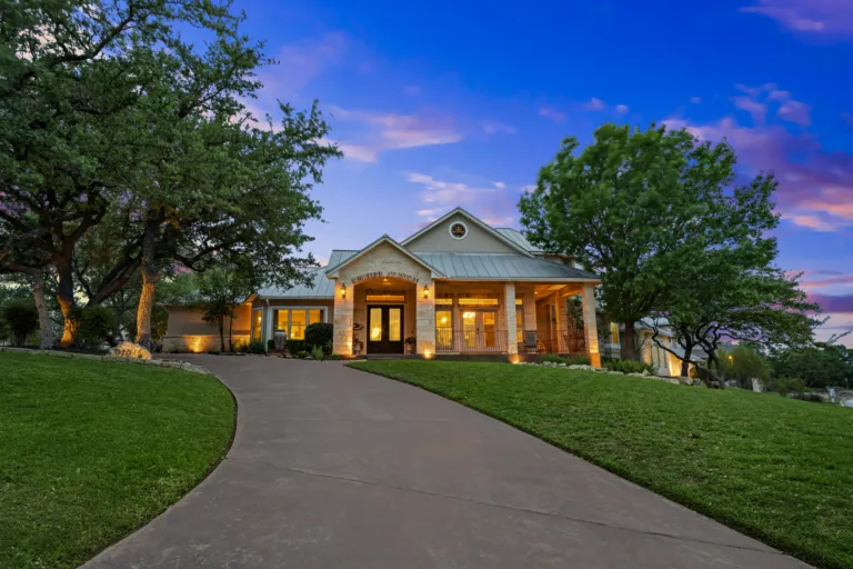 Middle Tennessee home with lush green lawn and landscaping from The Lawn Ranger