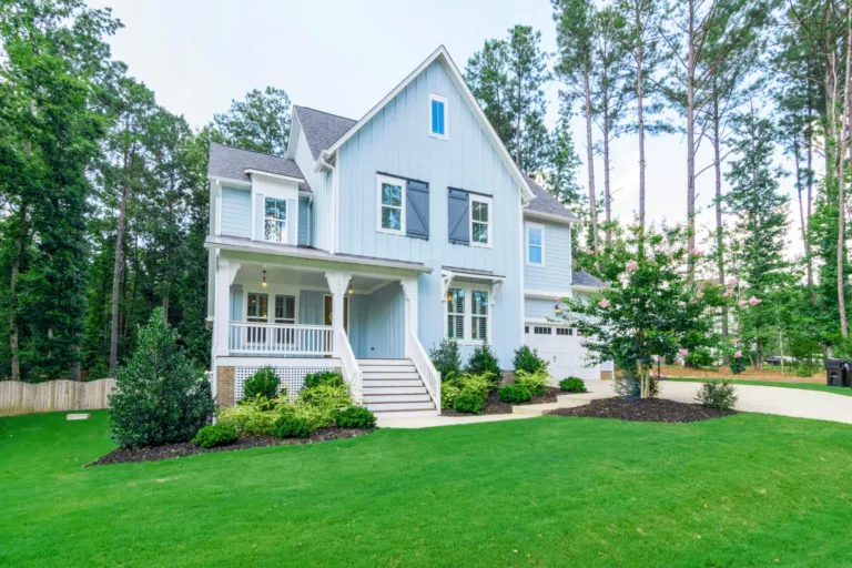 Middle Tennessee home with lush green lawn and landscaping from The Lawn Ranger